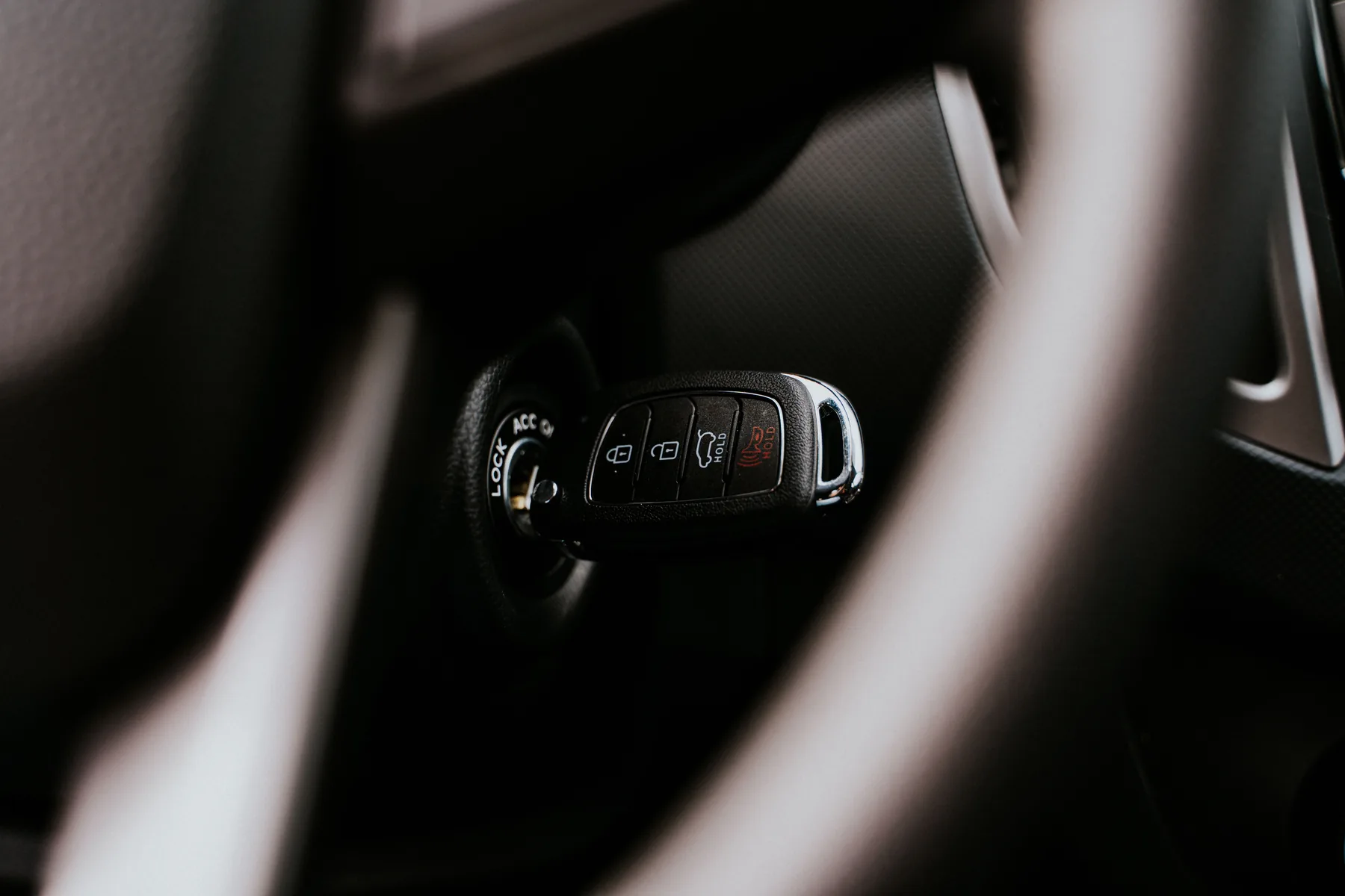 Car key in an ignition, illustrative photograph